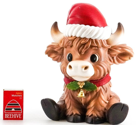 Traditional Highland Cow/Sitting
